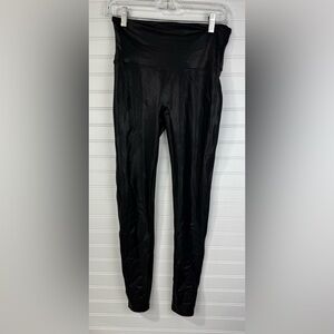 Spanx women’s faux leather look black stretch leggings. Size Large.